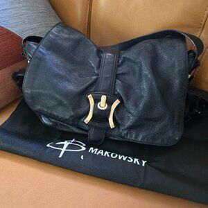 B Makowsky Black Leather Handbag with Gold Buckle Accent
